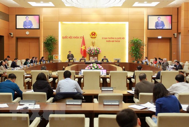 Thống nhất quy định một cơ quan cạnh tranh Quốc gia trực thuộc Bộ Công Thương Quang cảnh phiên họp. (Ảnh: An Đăng/TTXVN)
