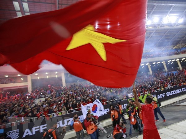Quốc kỳ Việt Nam sẽ lại tung bay tại đấu trường Asian Cup 2019. Ảnh: Trọng Đạt/TTXVN