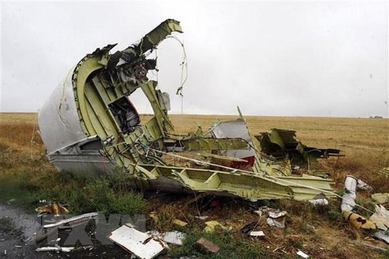 Vụ rơi máy bay MH17: Nga bác bỏ kết luận của Nhóm Điều tra quốc tế Xác máy bay MH17 của Hãng hàng không Malaysia Airlines bị bắn rơi gần làng Grabove, cách Donetsk, miền Đông Ukraine khoảng 80km. (Nguồn: AFP/TTXVN)