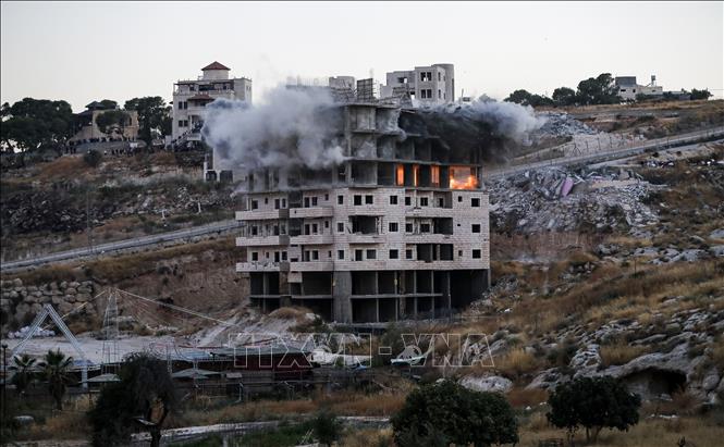  Một tòa nhà của người Palestine tại Sur Baher, Đông Jerusalem, bị phá dỡ ngày 22-7-2019. Ảnh: AFP/ TTXVN