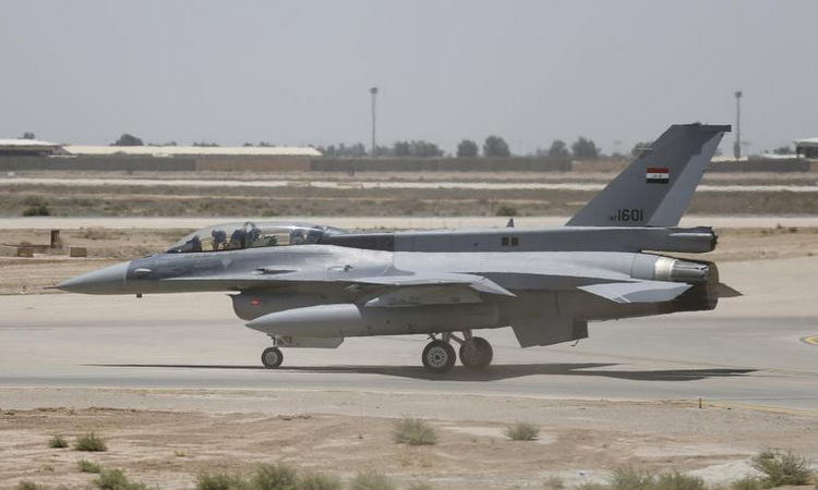 Tiêm kích F-16 Iraq triển khai ở căn cứ al-Balad. Ảnh: Reuters