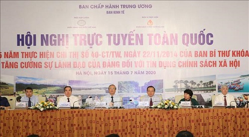 Sơ kết 5 năm Chỉ thị 40-CT/TW về tăng cường sự lãnh đạo của Đảng đối với tín dụng CSXH Thường trực Ban Bí thư Trần Quốc Vượng, Trưởng Ban Kinh tế Trung ương Nguyễn Văn Bình cùng các đại biểu dự Hội nghị - Ảnh: TTXVN