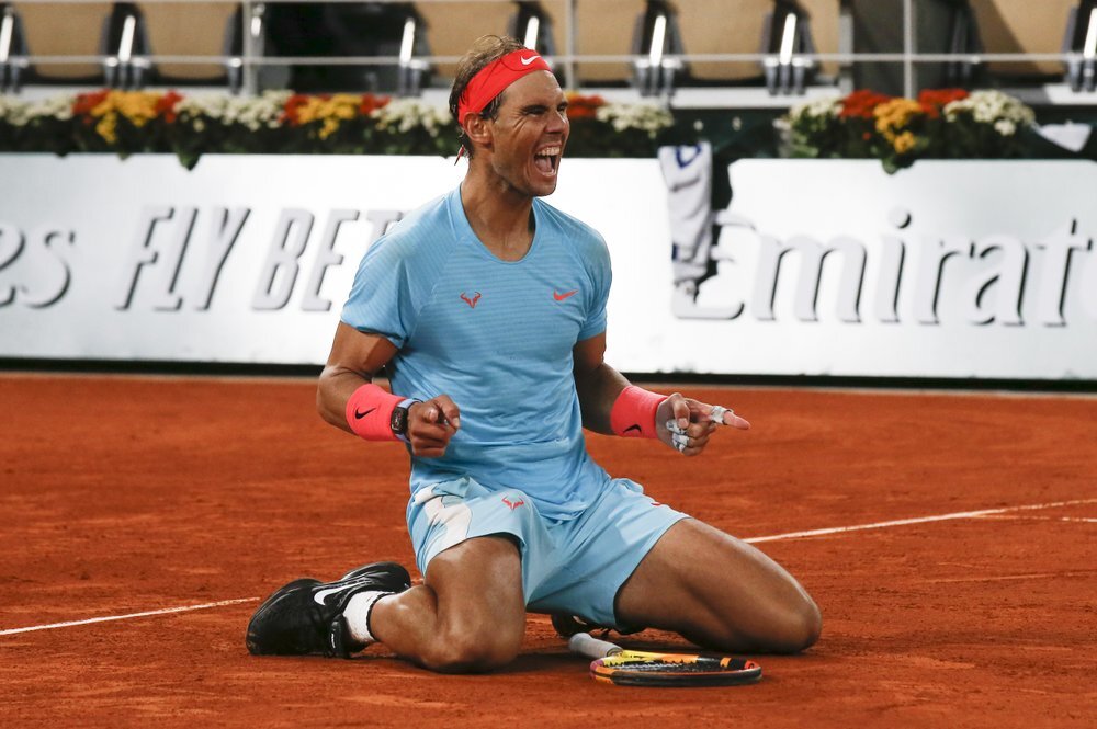 Nadal mừng chức vô địch thứ tư liên tiếp tại Roland Garros. Ảnh: AP