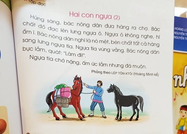 Bộ trưởng Phùng Xuân Nhạ giải trình các vấn đề liên quan đến sách giáo khoa lớp 1 Truyện Hai con ngựa, trong sách Cánh Diều sẽ được chỉnh sửa. Ảnh: PM/Vietnam+