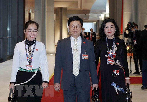 Các đại biểu đoàn Đảng bộ tỉnh Nghệ An đến dự phiên họp sáng 30-1-2021. (Ảnh: TTXVN)