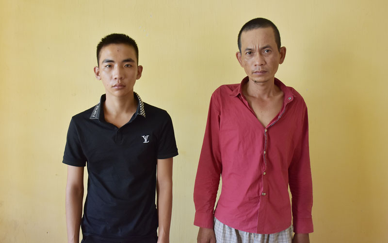 Đối tượng Nguyễn Tấn Đạt (trái) và Bùi Minh Tài. Ảnh: Nguyễn Đăng