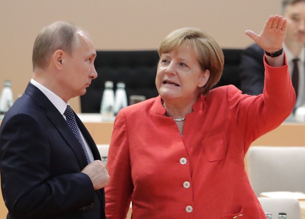 Lãnh đạo Đức, Nga điện đàm về tình hình Đông Ukraine Thủ tướng Angela Merkel và Tổng thống Vladimir Putin. Ảnh: AP