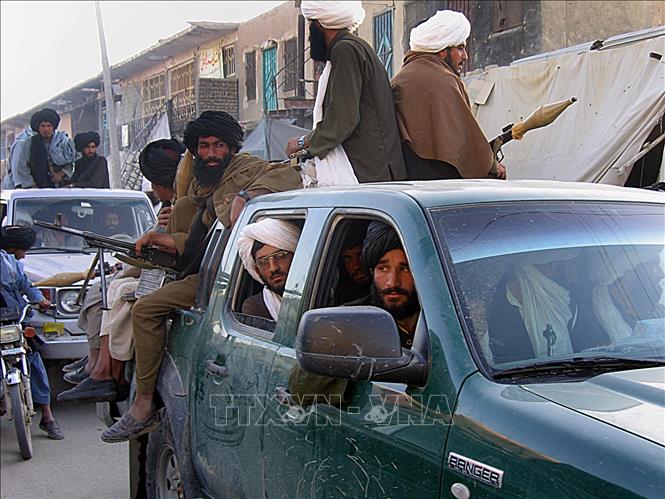 Các tay súng Taliban tại huyện Sangin, tỉnh Helmand, Afghanistan ngày 6-4-2009. Ảnh (tư liệu): AFP/TTXVN