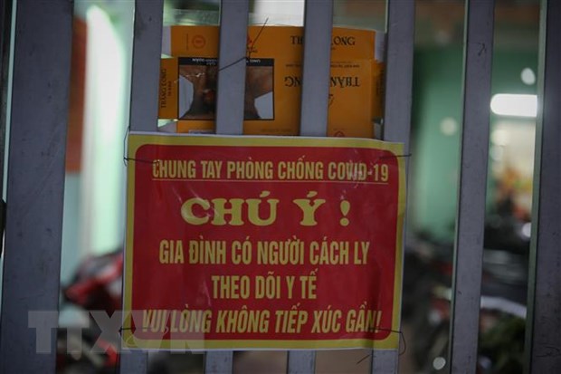 Tối 6-6-2021, ghi nhận 60 ca mắc mới trong nước, trong đó TP. Hồ Chí Minh 11 ca Biển cảnh báo treo trước cửa các xóm trọ có người dương tính với SARS-CoV-2 tại tổ dân phố My Diềm 1, huyện Việt Yên, tỉnh Bắc Giang. Ảnh: Danh Lam/TTXVN