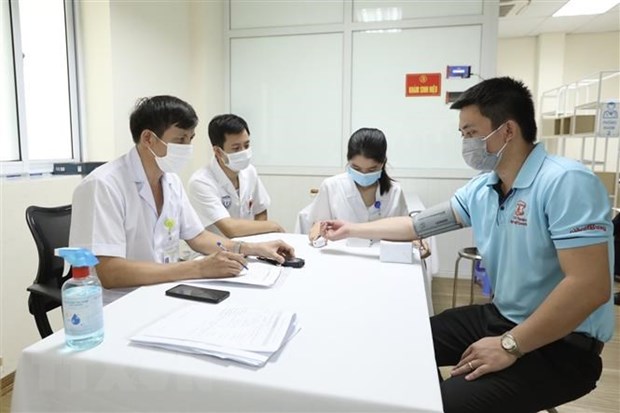 Ngày 12-6-2021, Việt Nam ghi nhận thêm 261 ca mắc COVID-19 mới Khu vực khám sàng lọc trước tiêm cho các tình nguyện viên tham gia tiêm thử nghiệm đợt 3 vaccine Nano Covax phòng COVID-19 tại Học viện Quân y. Ảnh: Minh Quyết/TTXVN