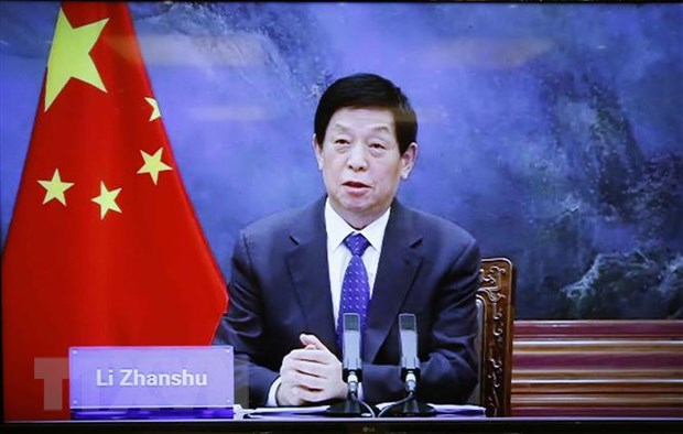 Chủ tịch Nhân đại Trung Quốc Lật Chiến Thư phát biểu. Ảnh: Doãn Tấn/TTXVN