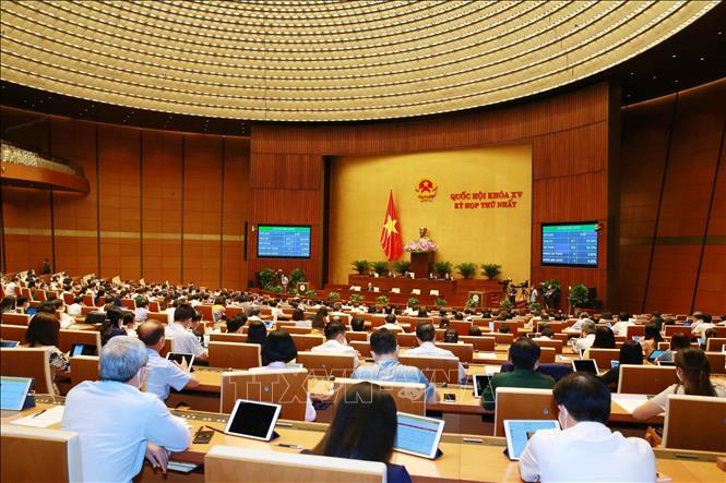 Quốc hội biểu thông qua Nghị quyết về điều chỉnh dự toán chi ngân sách nhà nước và phê chuẩn quyết toán ngân sách nhà nước năm 2019. Ảnh: Phương Hoa/TTXVN