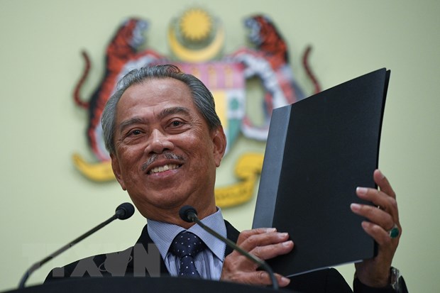 Thủ tướng Malaysia Muhyiddin Yassin phát biểu tại một cuộc họp ở Putrajaya ngày 9-3-2020. (Ảnh: AFP/TTXVN)