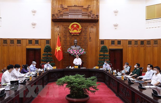 Thủ tướng chủ trì kiện toàn Ban Chỉ đạo Quốc gia phòng, chống dịch Ban Chỉ đạo Quốc gia phòng, chống dịch COVID-19 họp chiều 25-8. (Ảnh: Dương Giang/TTXVN)
