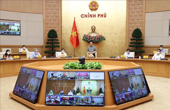 Thủ tướng: Tiếp tục triển khai hiệu quả công tác phòng, chống dịch ngay tại xã, phường Thủ tướng Phạm Minh Chính chủ trì cuộc họp. Ảnh: Dương Giang/TTXVN