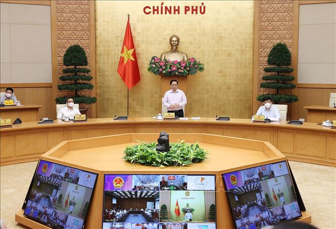 Thủ tướng: Phải đưa ra mục tiêu cụ thể khi thực hiện giãn cách xã hội Thủ tướng Phạm Minh Chính chủ trì cuộc họp trực tuyến với lãnh đạo tỉnh Kiên Giang và Tiền Giang. Ảnh: Dương Giang/TTXVN