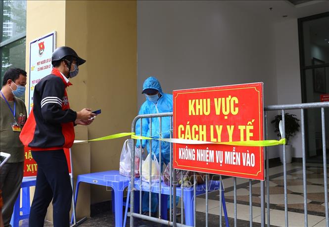 Ngày 19-11-2021, Việt Nam ghi nhận 9.625 ca nhiễm mới SARS-CoV-2, tại 57 tỉnh, thành phố Phong toả khu vực có dịch COVID-19. Ảnh: TTXVN