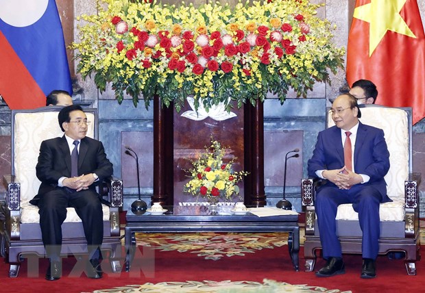 Chủ tịch nước Nguyễn Xuân Phúc tiếp Thủ tướng Lào Phankham Viphavanh Quang cảnh buổi tiếp. (Ảnh: Thống Nhất/TTXVN)