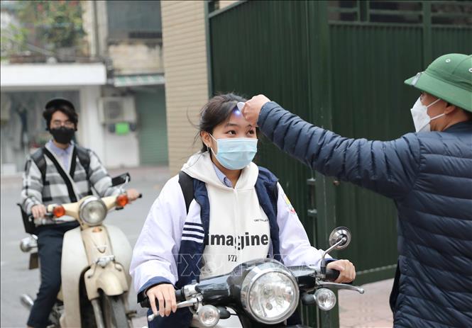 Ngày 12-1-2022, Việt Nam có 16.135 ca nhiễm mới SARS-CoV-2, trong ngày có 38.943 ca khỏi bệnh Kiểm soát dịch COVID-19 trong cộng đồng. Ảnh: TTXVN