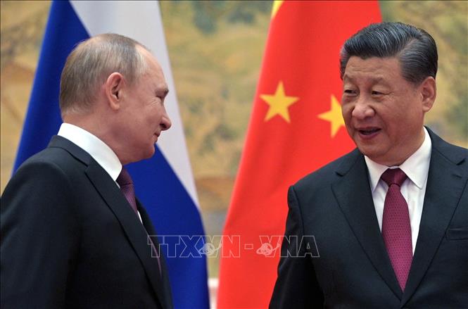 Chủ tịch Trung Quốc Tập Cận Bình (phải) và Tổng thống Nga Vladimir Putin tại cuộc gặp ở Bắc Kinh, Trung Quốc, ngày 4-2-2022. Ảnh: AFP/TTXVN