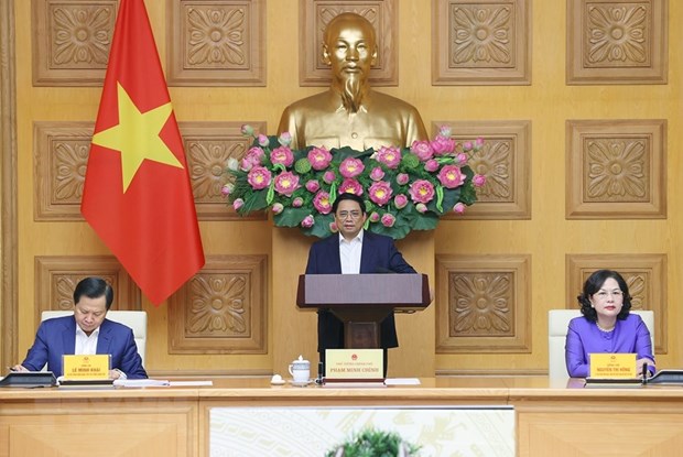 Thủ tướng Phạm Minh Chính và Phó thủ tướng Lê Minh Khái chủ trì buổi gặp mặt của Thủ tướng Chính phủ với các chủ tịch, tổng giám đốc các ngân hàng thương mại. Ảnh: Dương Giang/TTXVN