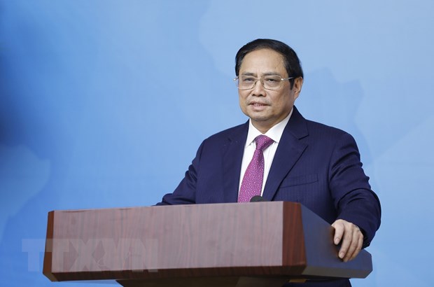 Thủ tướng Phạm Minh Chính chủ trì Hội nghị tổng kết công tác ngoại giao vaccine. (Ảnh: Dương Giang/TTXVN)