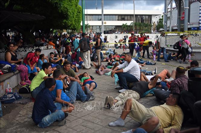 Người di cư Honduras tại khu vực Tapachula, bang Chiapas, Mexico, trong hành trình tới Mỹ ngày 21-10-2018. Ảnh: AFP/TTXVN