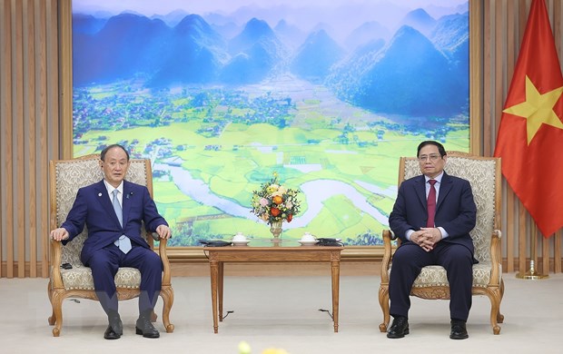 Thúc đẩy quan hệ Đối tác chiến lược sâu rộng Việt Nam - Nhật Bản Thủ tướng Phạm Minh Chính tiếp nguyên Thủ tướng Nhật Bản Suga Yoshihide. Ảnh: Dương Giang/TTXVN