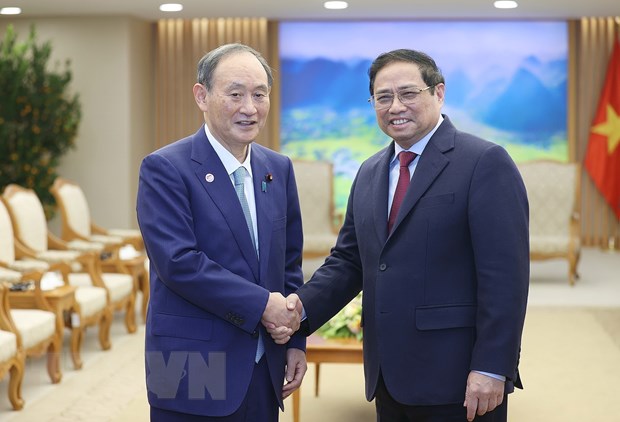 Thúc đẩy quan hệ Đối tác chiến lược sâu rộng Việt Nam - Nhật Bản Thủ tướng Phạm Minh Chính tiếp nguyên Thủ tướng Nhật Bản Suga Yoshihide. Ảnh: Dương Giang/TTXVN