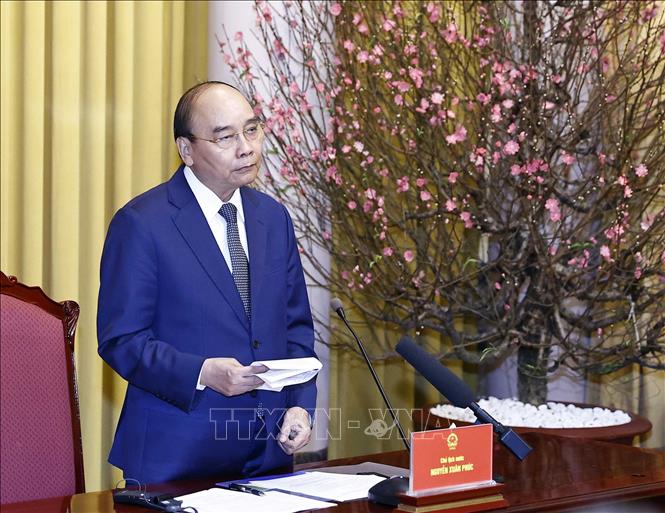 Chủ tịch nước tiếp đại biểu quốc tế dự kỷ niệm 50 năm Ngày ký Hiệp định Paris Chủ tịch nước Nguyễn Xuân Phúc phát biểu. Ảnh: Thống Nhất/TTXVN