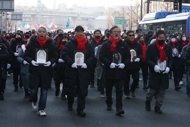 Gia đình các nạn nhân vụ Itaewon tuần hành tại Seoul, Hàn Quốc. (Nguồn: The Korea Times)