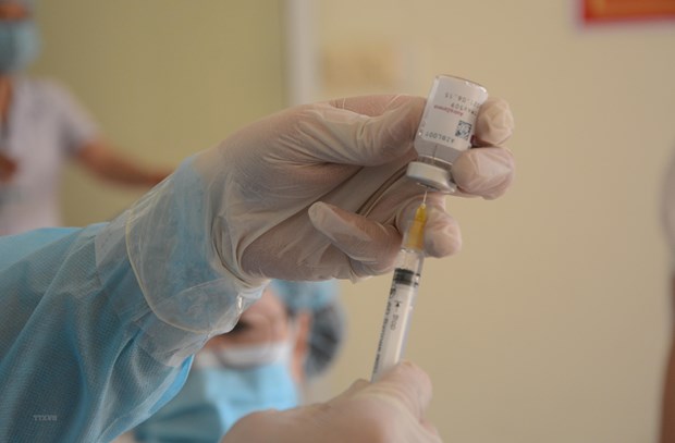 Tiêm vắc-xin ngừa COVID-19. Ảnh: Văn Dũng/TTXVN
