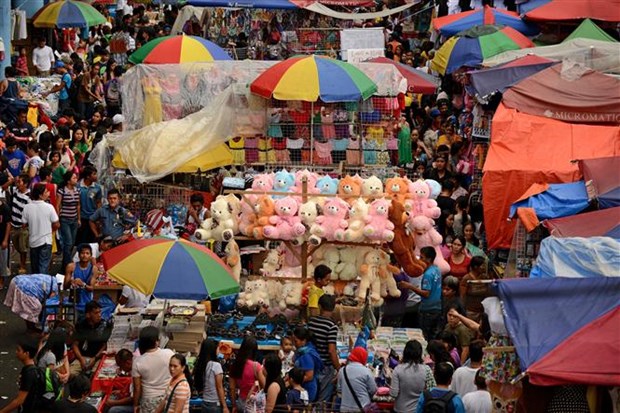 Hiệp định RCEP chính thức có hiệu lực đối với Philippines Một khu chợ ở Manila (Philippines). Ảnh: AFP/TTXVN