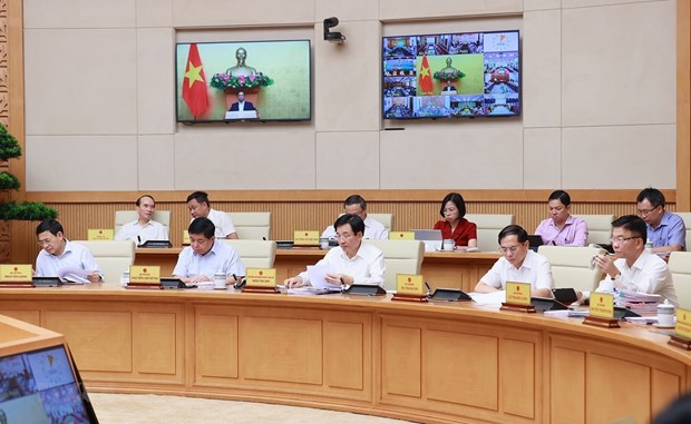 Các Bộ trưởng và đại diện các cơ quan thuộc Chính phủ tham dự Phiên họp Chính phủ thường kỳ tháng 5. Ảnh: Dương Giang/TTXVN