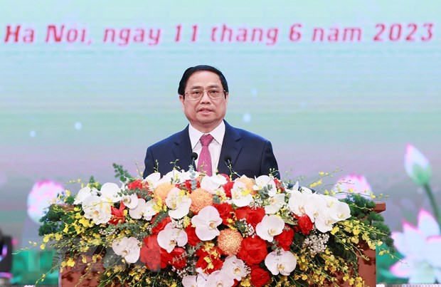 Thủ tướng Phạm Minh Chính phát biểu tại Hội nghị biểu dương, tôn vinh điển hình tiên tiến toàn quốc. Ảnh: Dương Giang/TTXVN