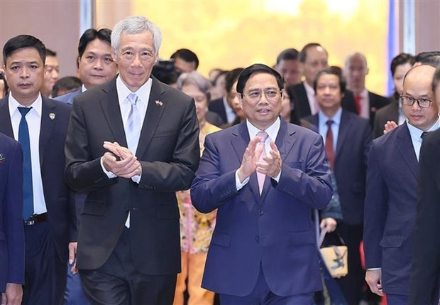 Thủ tướng Singapore kết thúc thăm Việt Nam: Ký kết 7 văn kiện hợp tác Thủ tướng Lý Hiển Long và Thủ tướng Phạm Minh Chính dự Hội nghị Thúc đẩy triển khai các Dự án hợp tác Việt Nam-Singapore, tại Hà Nội sáng 29-8-2023. (Ảnh: Dương Giang/TTXVN)