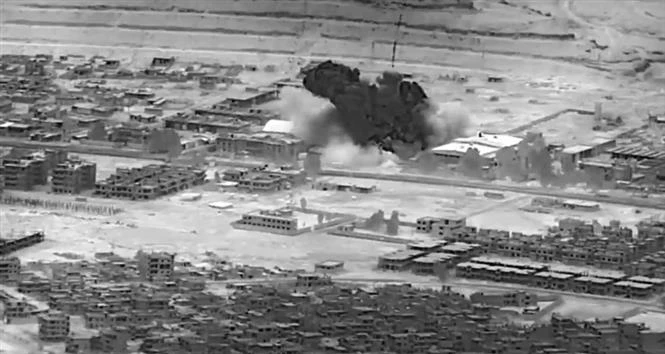 Nhóm vũ trang tại Iraq nhận là thủ phạm vụ tấn công căn cứ Mỹ tại Syria Mỹ không kích một kho chứa vũ khí ở miền Đông Syria. (Ảnh: AP/TTXVN)