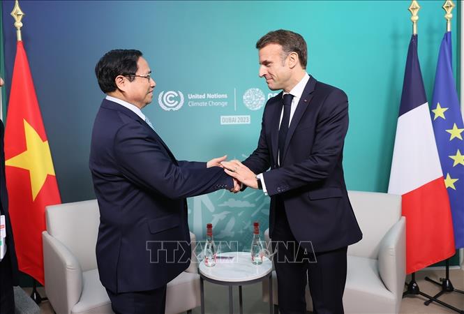 Thủ tướng Phạm Minh Chính gặp Tổng thống Pháp Emmanuel Macron. Ảnh: Dương Giang/TTXVN