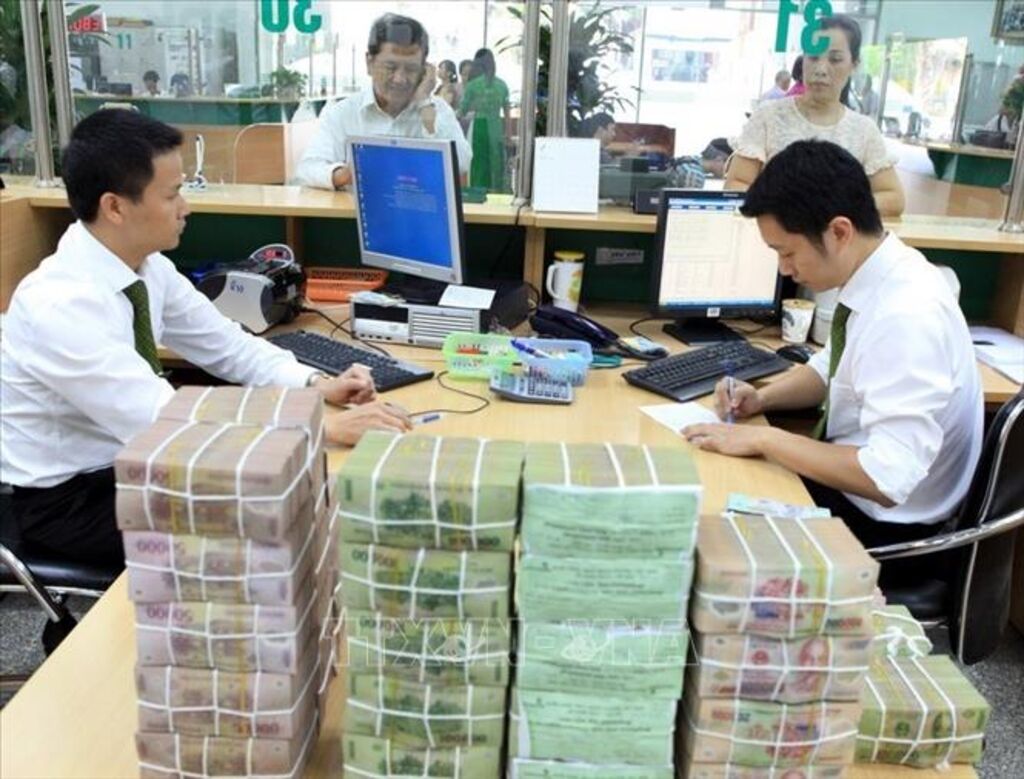 Hoạt động tại Vietcombank chi nhánh Hà Nội. Ảnh minh họa: Trần Việt/TTXVN