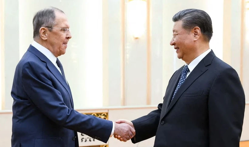 Ngoại trưởng Nga Sergei Lavrov (trái) đã có cuộc gặp với Chủ tịch Trung Quốc Tập Cận Bình ngày 9-4. (Nguồn: Reuters)