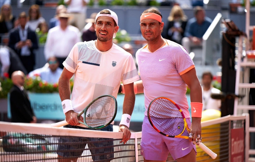 Rafael Nadal thắng nhọc đối thủ vô danh ở Madrid Open 2024 Rafael Nadal (phải) mất quá nhiều thời gian và sức lực để vượt qua Pedro Cachin (Ảnh: Getty)