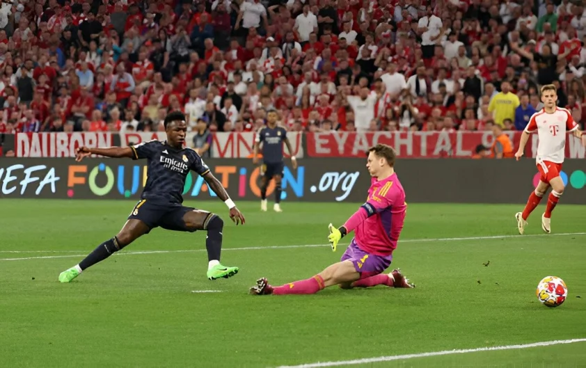 Rượt đuổi mãn nhãn, Real Madrid nắm lợi thế trước trận lượt về với Bayern Munich Vinicius ghi bàn mở tỷ số cho Real Madrid (Ảnh: Getty).