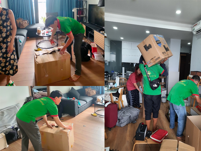 Đội ngũ nhân viên Chuyển Nhà 24H đang giúp quý khách đóng thùng đồ đạc.