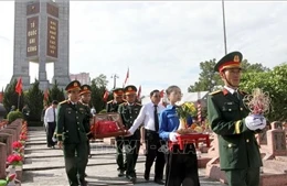 Truy điệu, an táng 76 hài cốt liệt sĩ Việt Nam hy sinh tại Lào