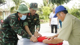 Giồng Trôm cất bốc, quy tập hài cốt liệt sĩ tại Nghĩa trang tạm Miếu Quang Long ấp Tân Thị Đình, xã Tân Hào